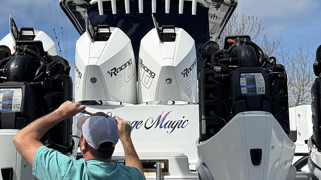 Outboards being serviced dockside at the end of the season in Ocean City